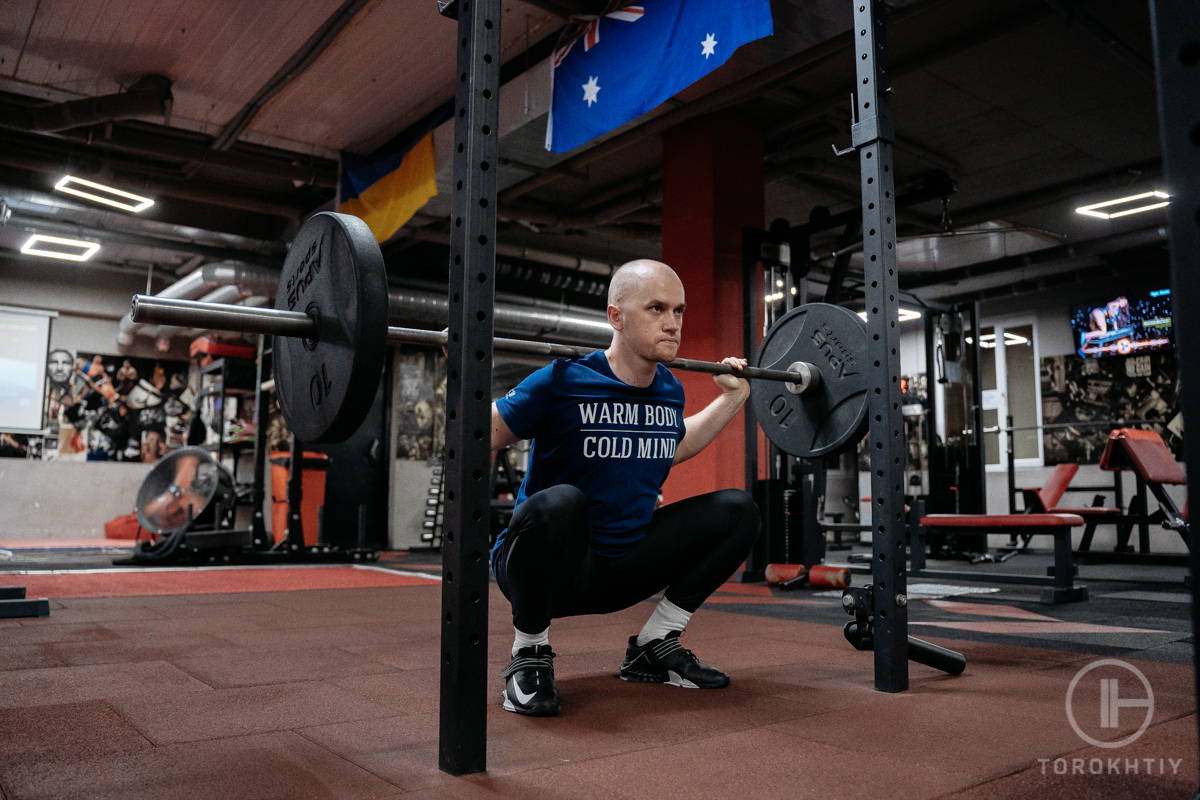 Athlete with Squat Rack