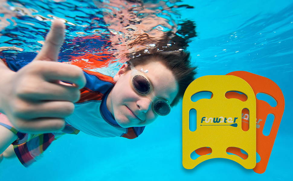 A little boy wearing swimming goggles in the pool gives this swimkickboard a thumbs up