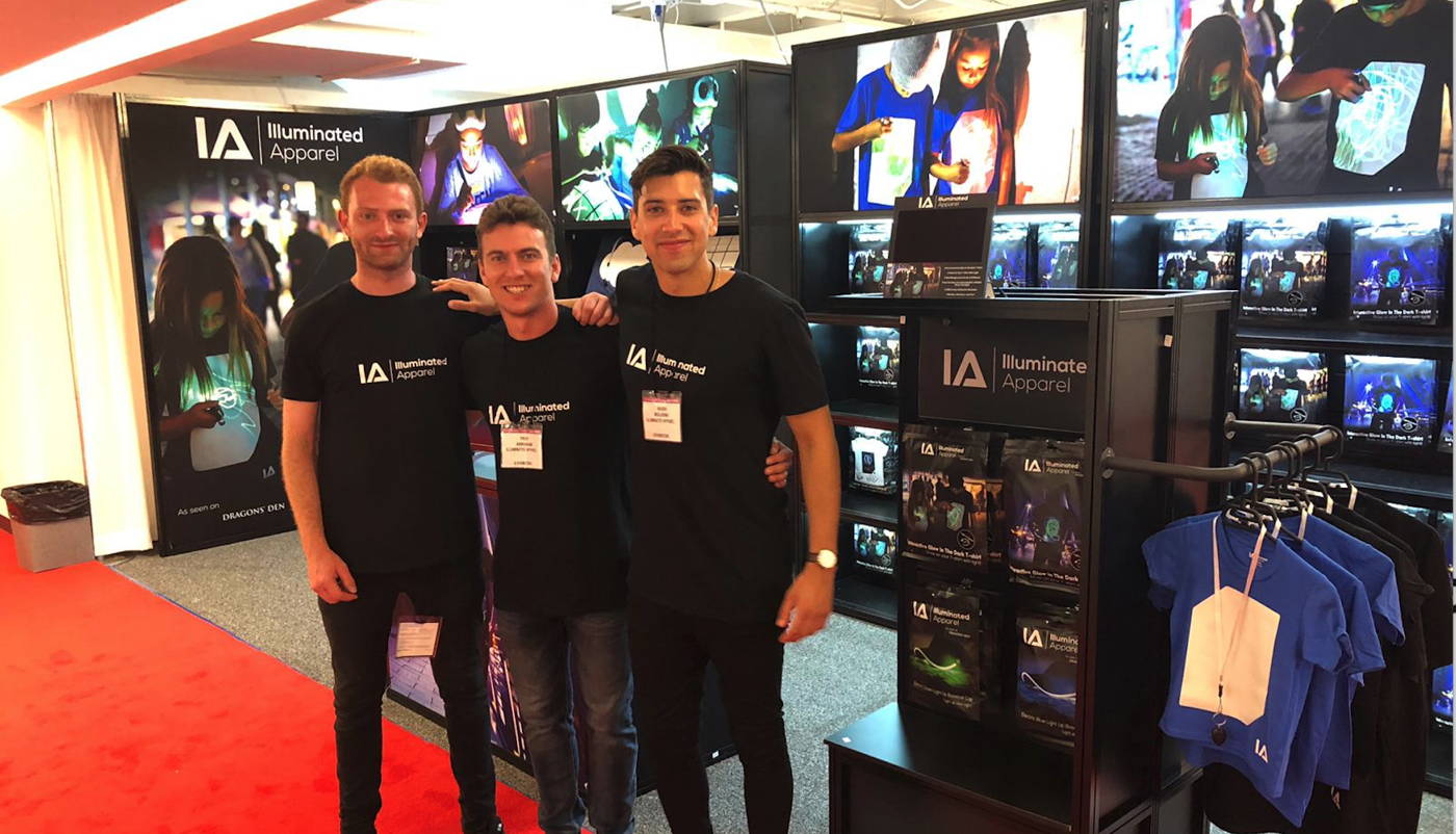 The Illuminated Apparel team on their stand at a trade show