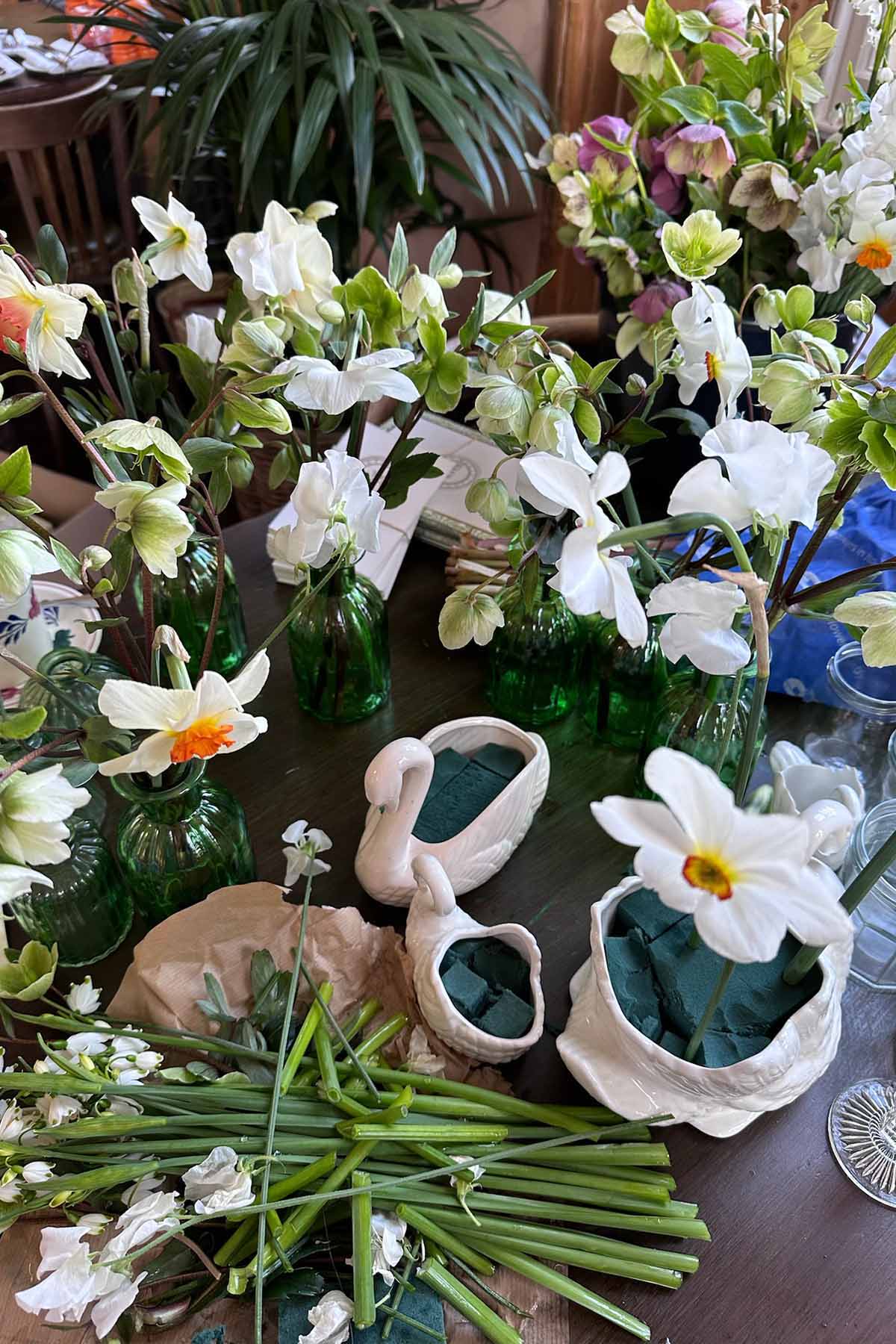 Setting a spring table with freshly picked flowers
