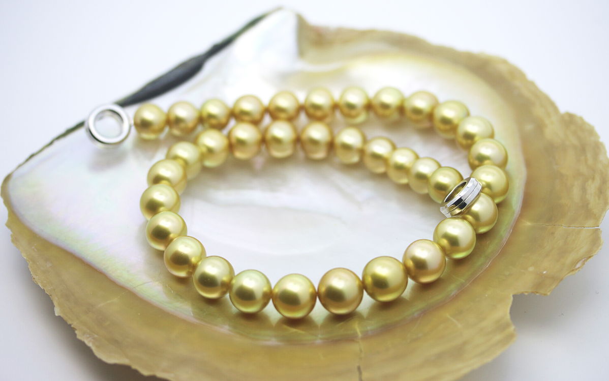 South Sea Gold Pearl Strand in an Oyster Shell