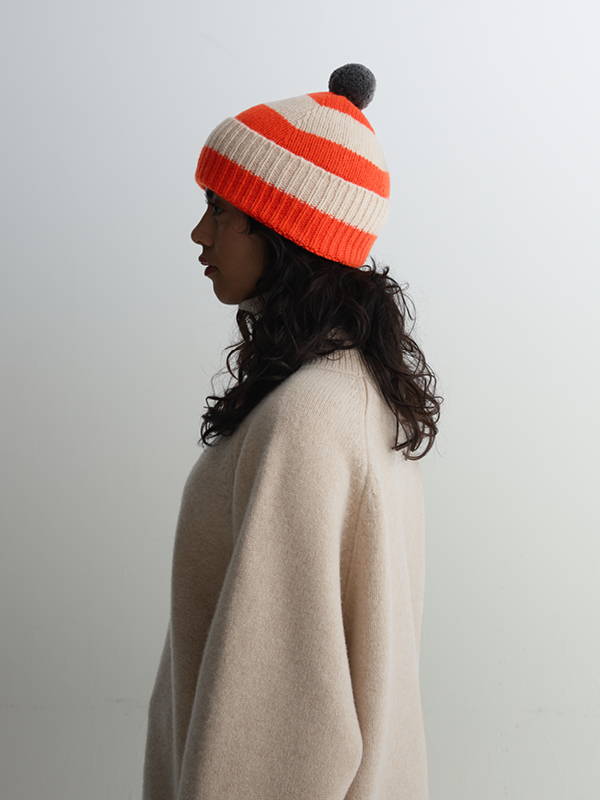 Model wears Stripe Pompom Hat