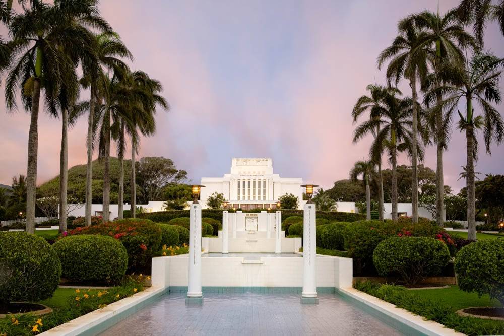 LDS art Laie Temple picture, focusing on the reflection pools and a pastel sky. 