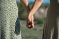 women holding hands