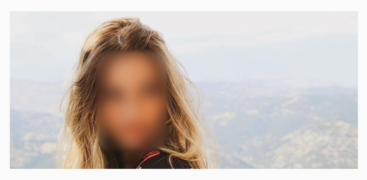 portrait of a girl with blurred out face 