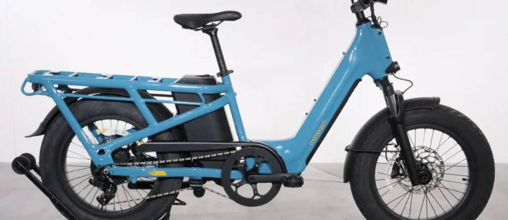 a blue Momentum Cito E+ electric cargo bike