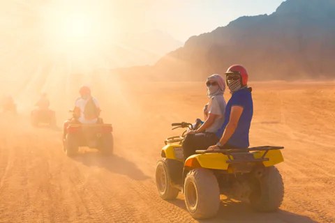 Desert Safari with BBQ Dinner, Camel Ride & Quad Biking
