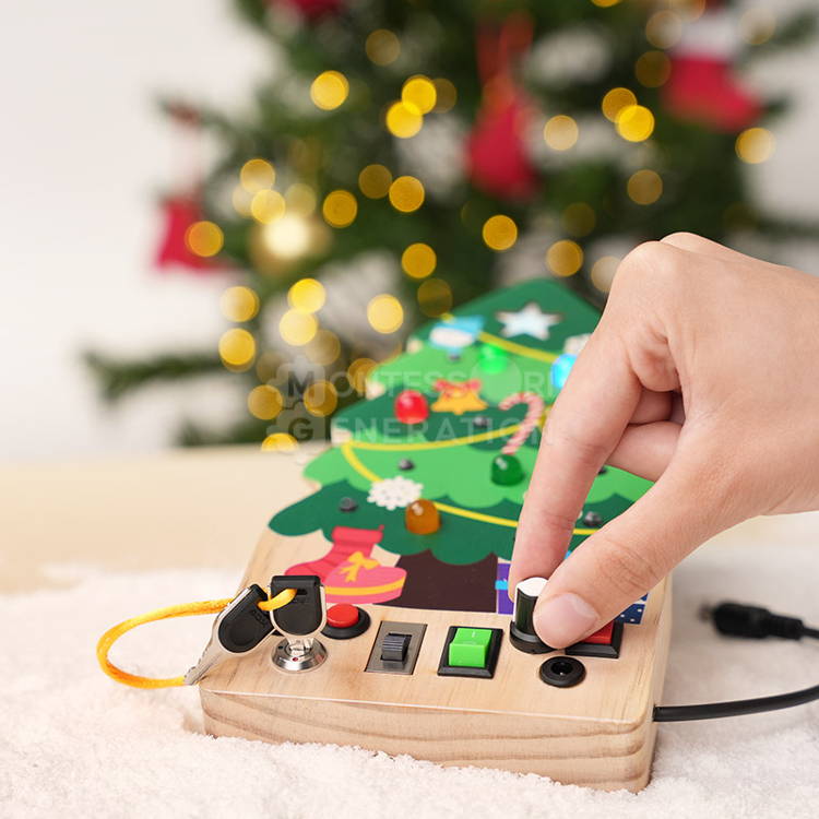 Woman's hand interacting with a Montessori Christmas Switch Board by twisting a knob that turns the lights on.