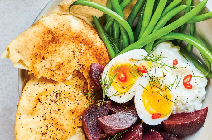 Lunch Bowl with Egg, Vegetables, Hummus and Toasted Pita