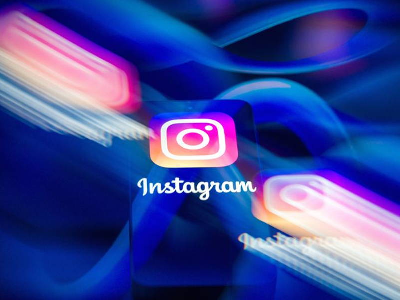 The Instagram logo is displayed on a smartphone screen in this photo illustration in Brussels, Belgium, on March 29, 2026. Governments, parents, and regulators are advocating for stricter safeguards to protect children online following lawsuits and invest