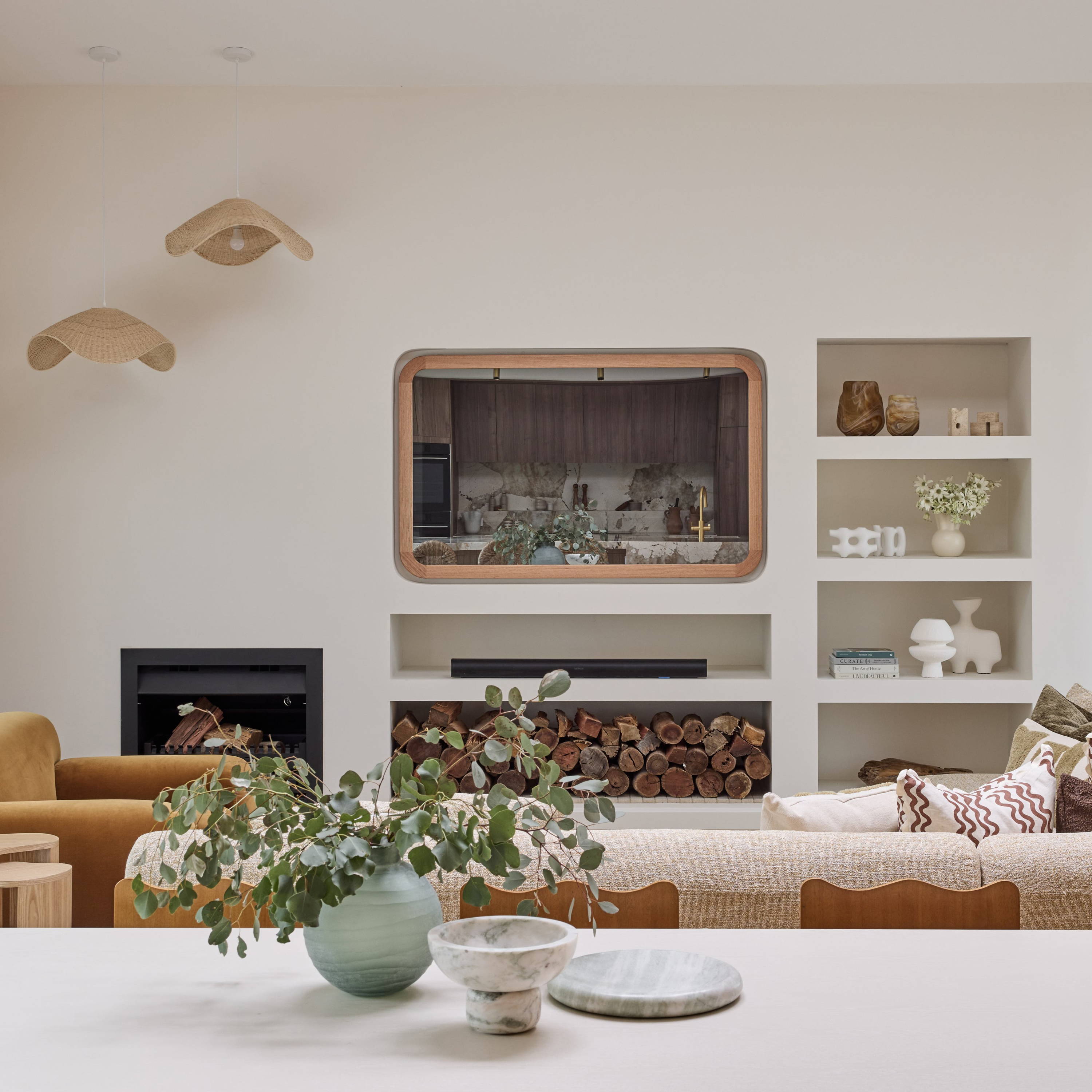 Contemporary Curve TV-Mirror by FRAMING TO A T - As seen on The Block in Courtney and Grant's Living and Dining Room, this Danish-inspired light oak timber framed TV Mirror features contemporary curved corners.