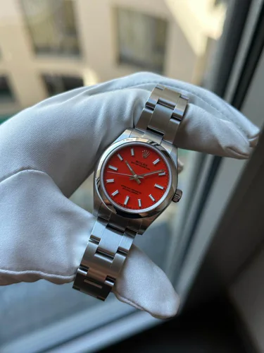 Rolex Oyster Perpetual 31 Red Dial