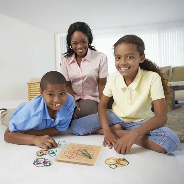African-American family playing with Montessori Wooden Geoboard in their home.