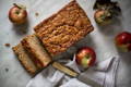 An overhead view of sliced apple cake