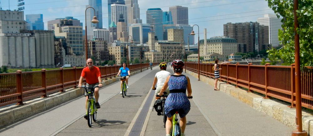 NiceRide cyclists on Stone Arch Bridge Minneapolis Minnesota