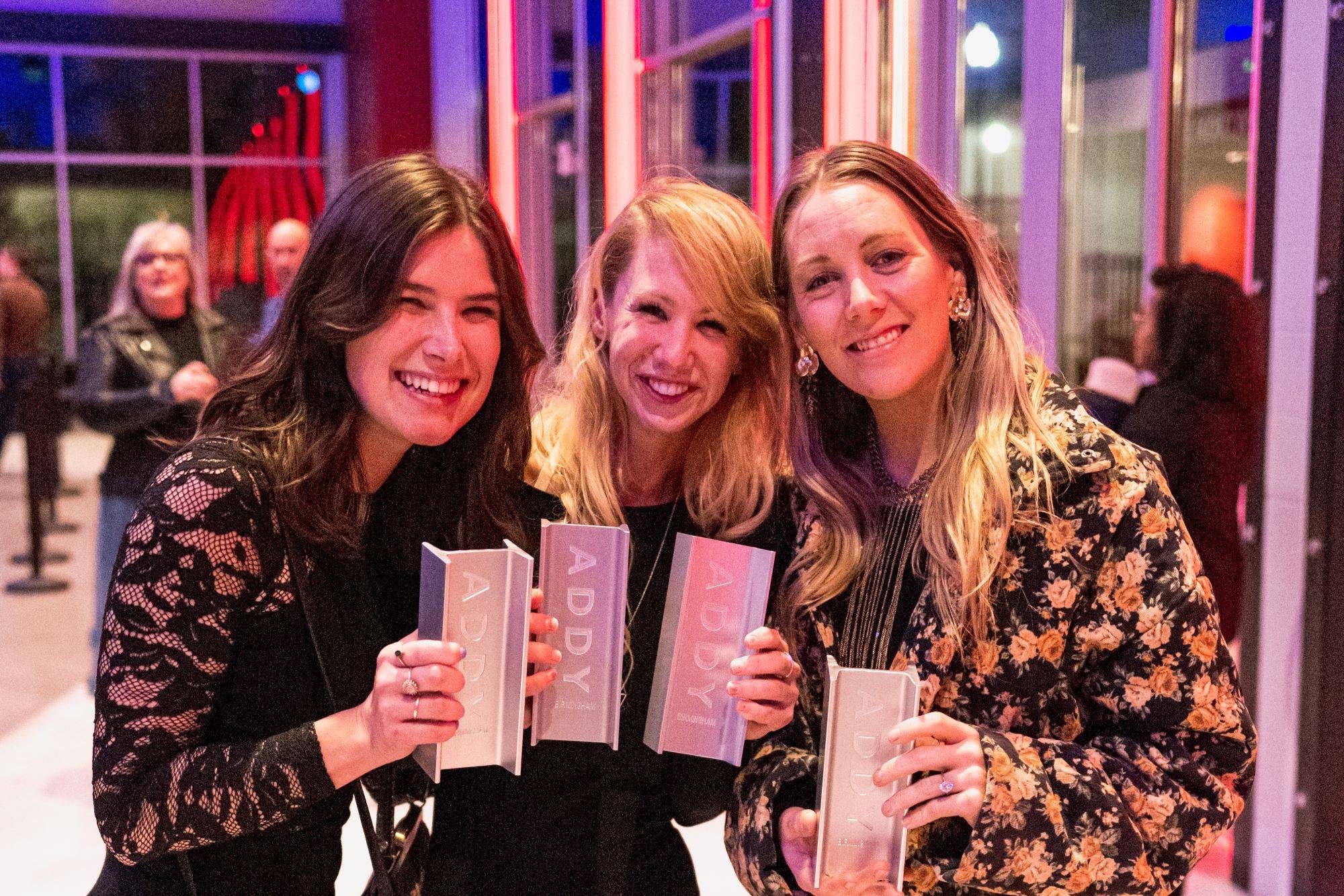 Communications Specialist Ingrid Schnader, Art Director Tori Riddle, and Creative Director Amy Sibert at the 2023 American Advertising Awards in Birmingham, Alabama.