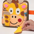 Front cover of the Montessori Genius Giraffe Book.