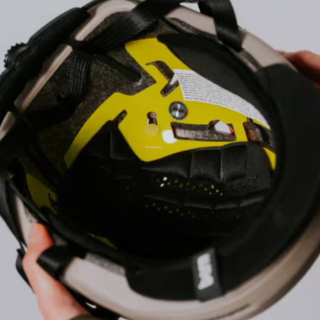 a yellow mips bike helmet