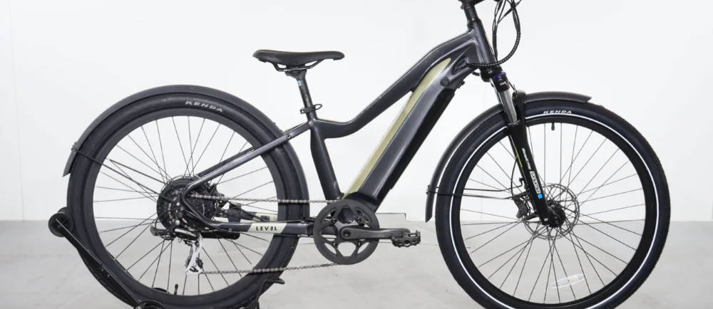 A black Aventon Level electric city bike