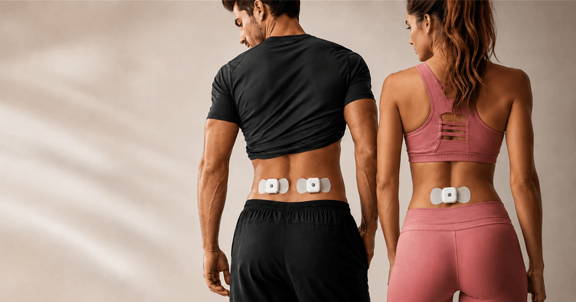 Man and woman wearing Wellue wireless TENS pods on the lower back to illustrate multi-user pain relief and clinical evaluation.