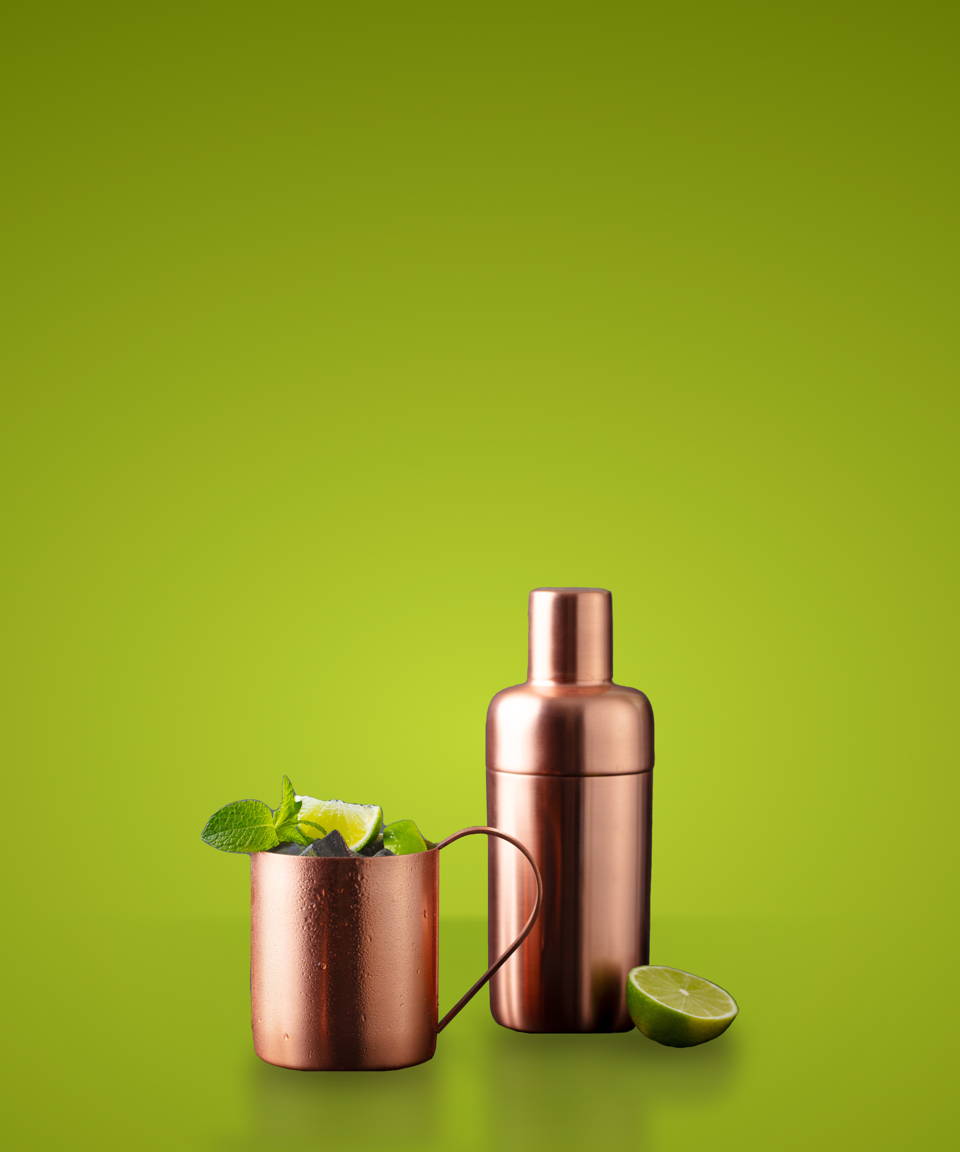 Wellness elixir mocktail in a copper mug and a shaker (small)