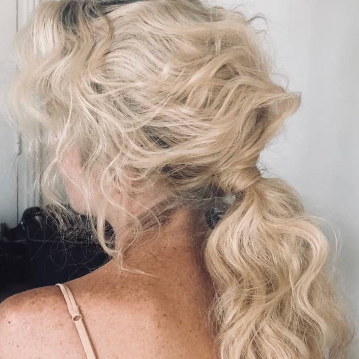 messy twisted low ponytail