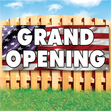 Wood fence displaying a banner saying 'GRAND OPENING' in white text on a american flag background