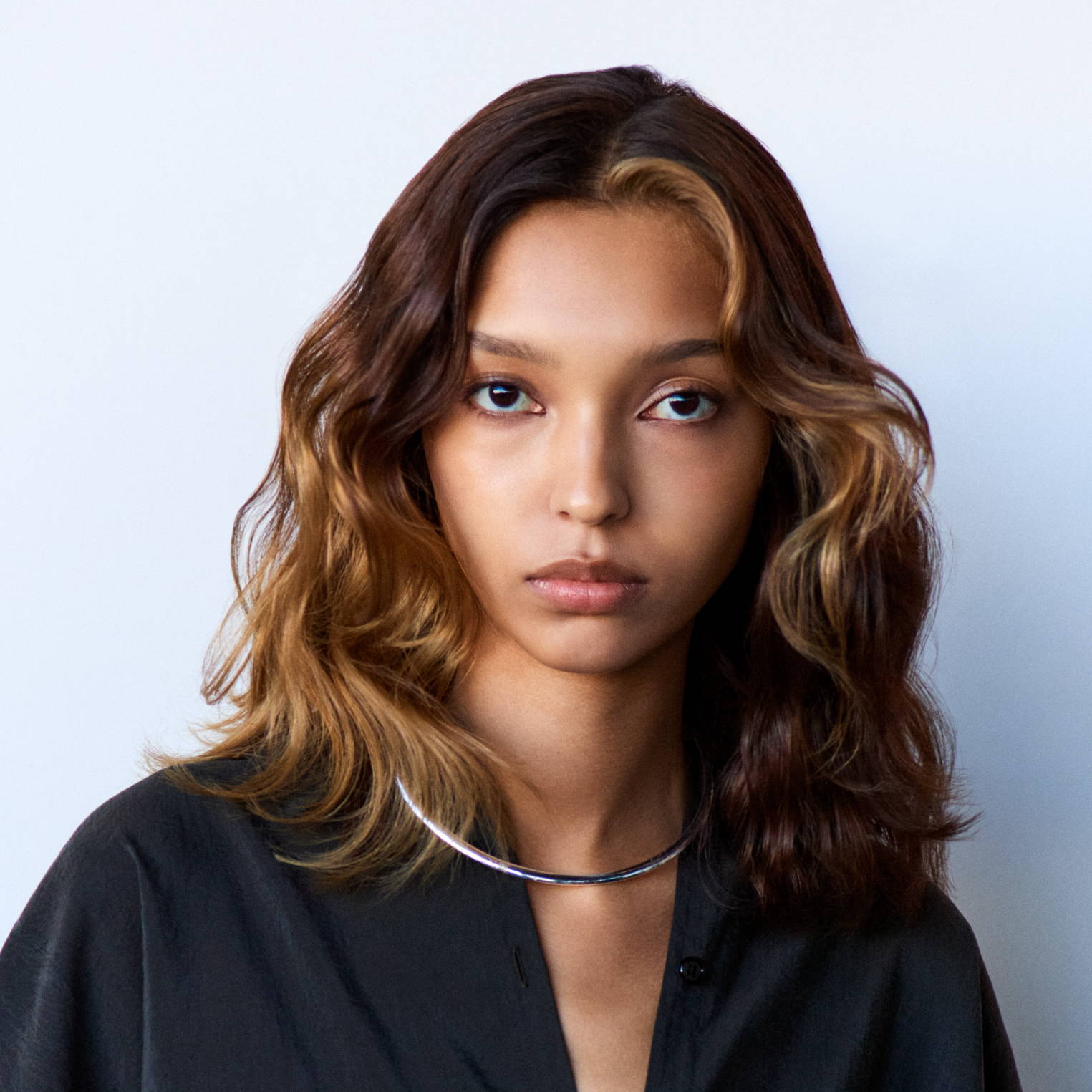 Davines hair model with layered brown hair