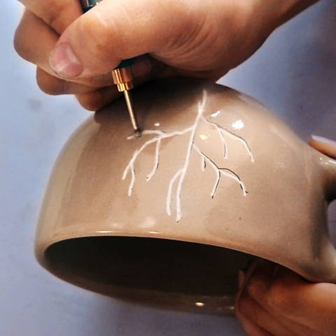 Ceramic engraver