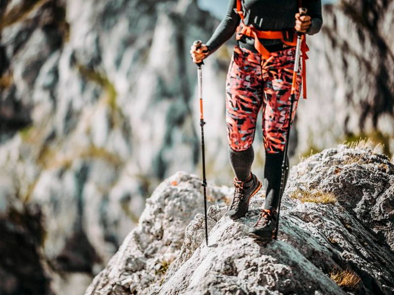 Image may contain: Adventure, Hiking, Leisure Activities, Nature, Outdoors, Person, Bag, Walking, Sword, Weapon, and Backpack