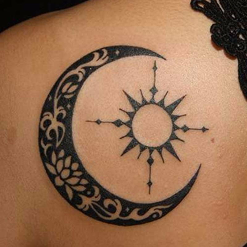 Sun Inside Of Moon Tattoo