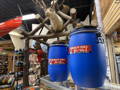 two bear barrels sitting on a counter in the frost river shop