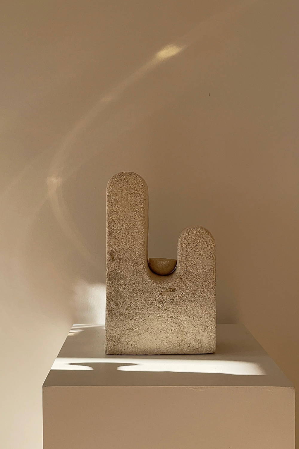 Gilani Collection Sculpture Art by Evelyn Michaelides - Hand-carved, organic-shaped limestone sculpture art.