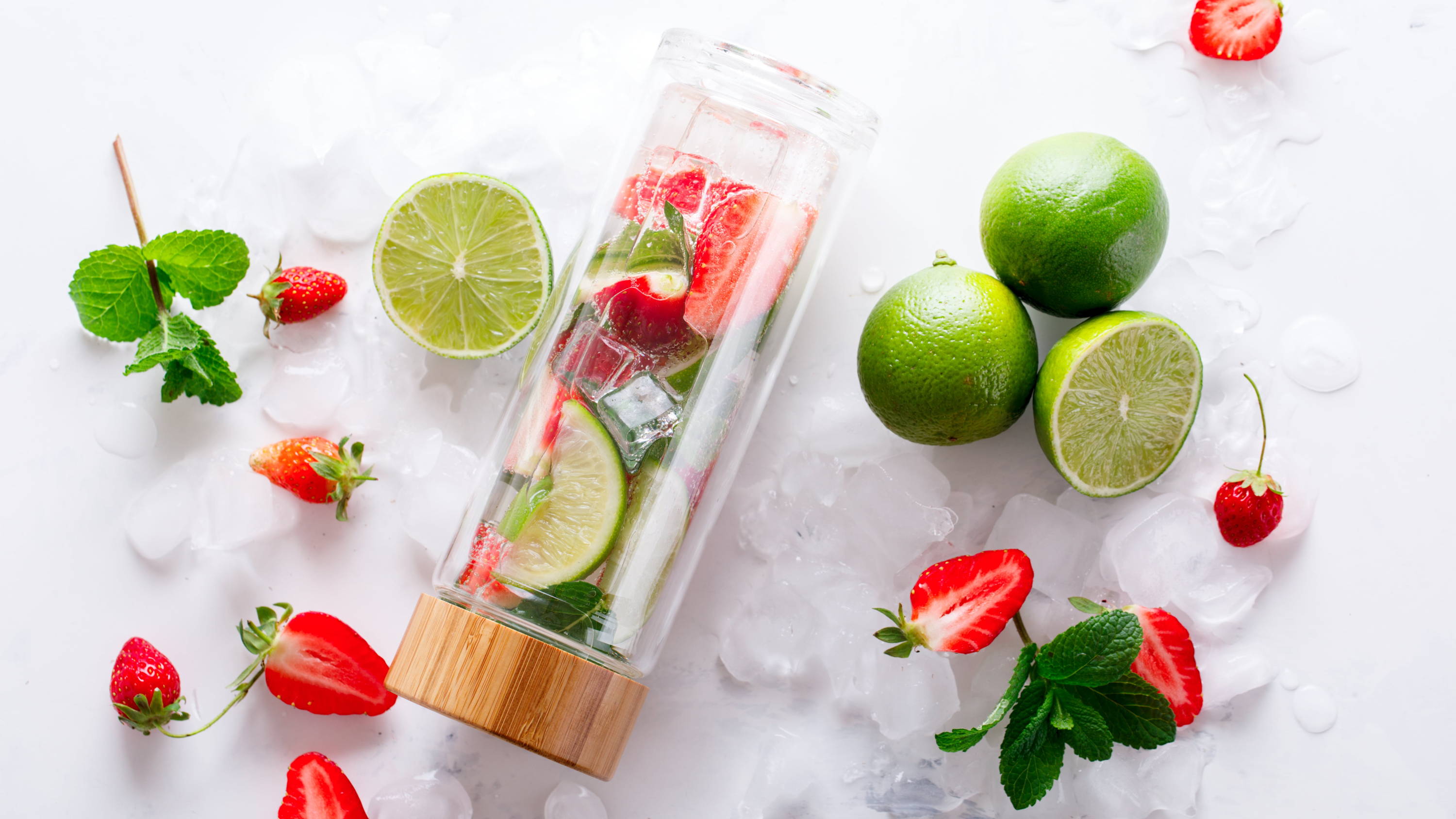 Strawberry, Lime and Mint Water in a glass bottle