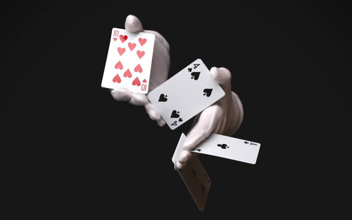 Gloved magician hands showing various cards for Confetti's Virtual Magic Show 