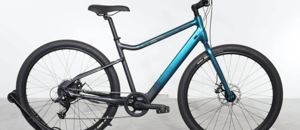 a blue and black Cannondale Treadwell Neo 2 electric city bike