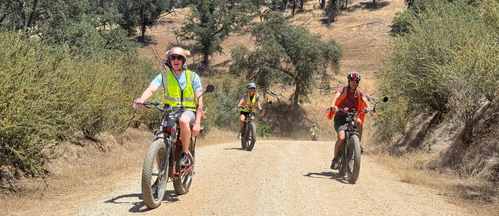 four riders on aventon aventure electric bikes in the sierra foothills on a tour with Yosemite E-Biking (yosemiteebiking.com)