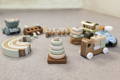 Group of wooden Montessori toys on display.
