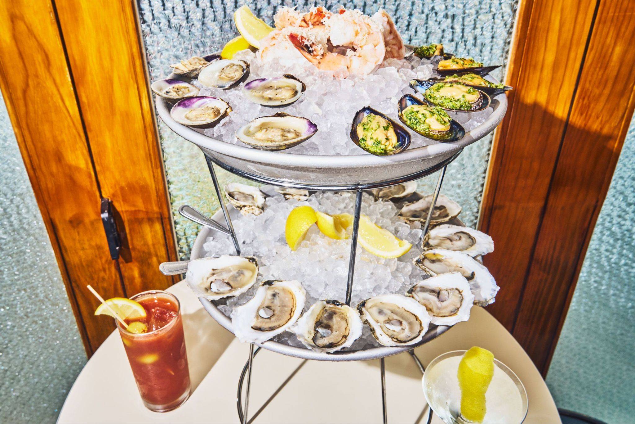 Oysters and other seafood on tiered plates