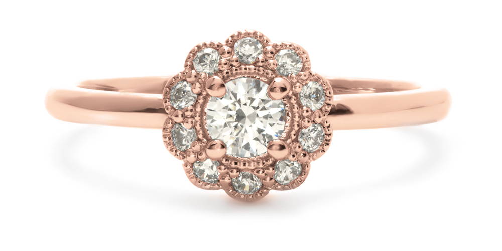 Rose gold halo engagement ring