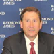 Raymond James' two-hatted Helck addresses his advisor crowd on both levels