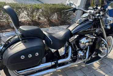 2016 HARLEY-DAVIDSON SOFTAIL DELUXE (VIVID BLACK) motorcycle for rent near BRADENTON, FL