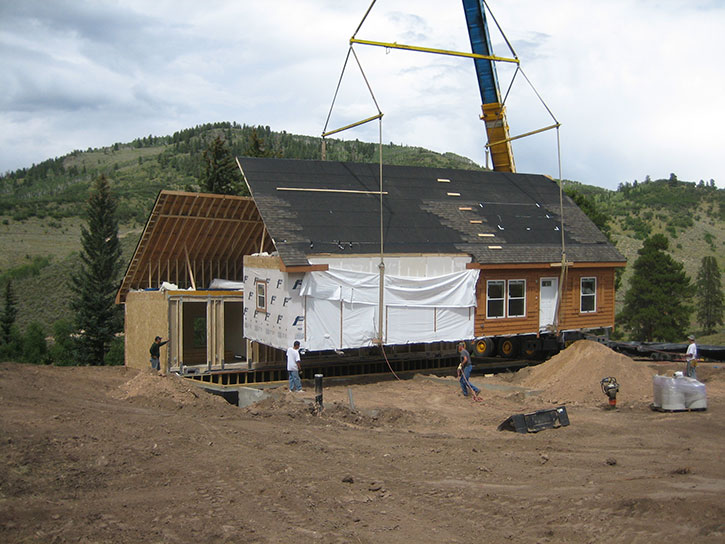 don't get squished under a crane-set modular home