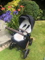 Buggy style sheepskin liner in the Cybex Priam