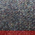 Zoom sur une étoffe de Tweed en laine au motif sergé gris bleu