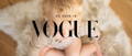 As Seen In Vogue text on top of an image of a blonde child on a luxury sheepskin rug