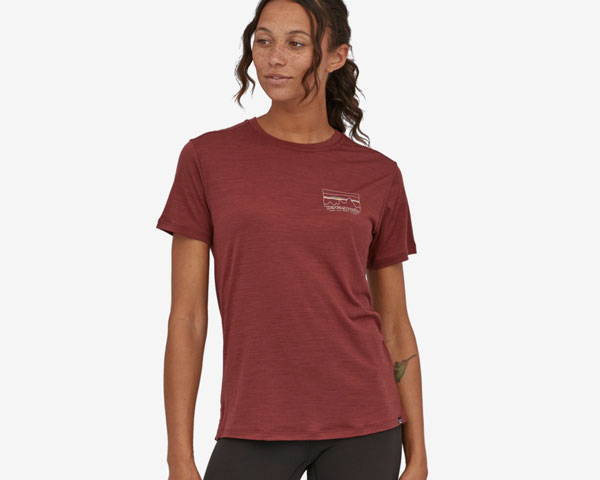 Woman wearing soft red printed t-shirt from sustainable clothing brand Patagonia