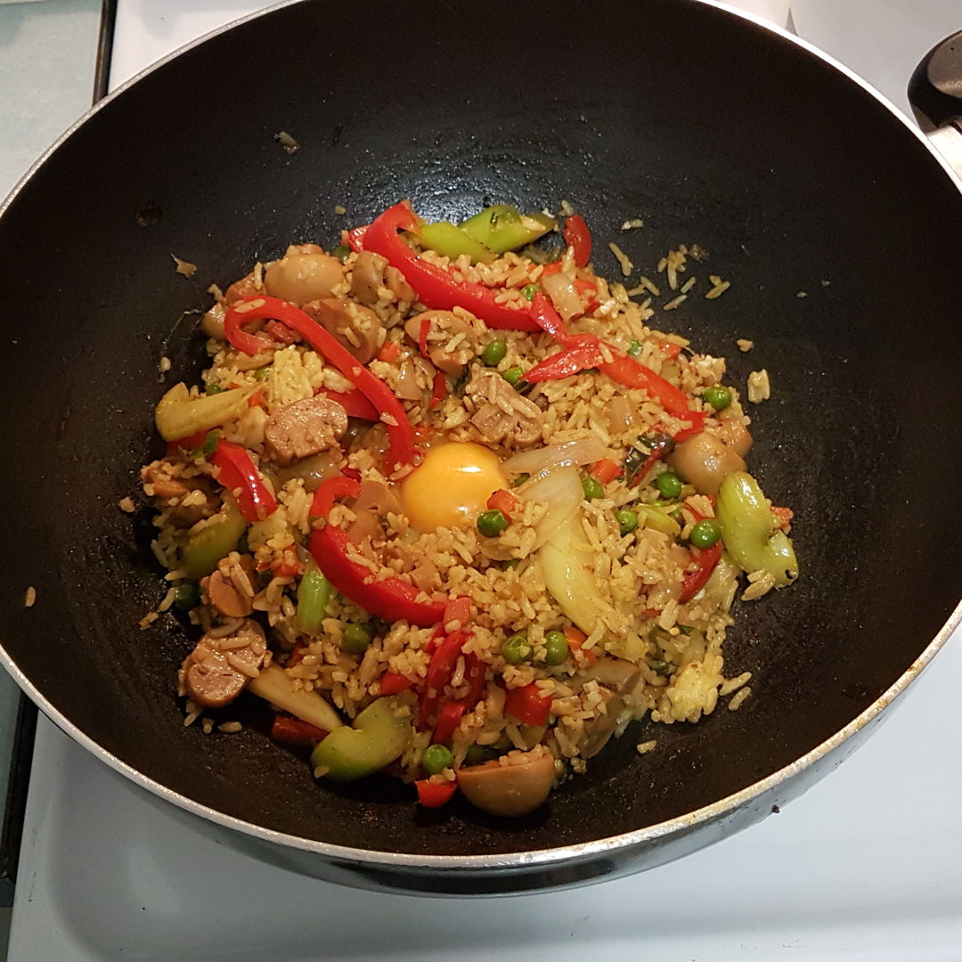 I used the Pineapple Fried Rice recipe as inspiration to use left over rice and some vegetables. I included mushrooms, celery, capsicum and some frozen peas. Follow the Nyonya Cooking recipe but use whatever ingredients you have. 