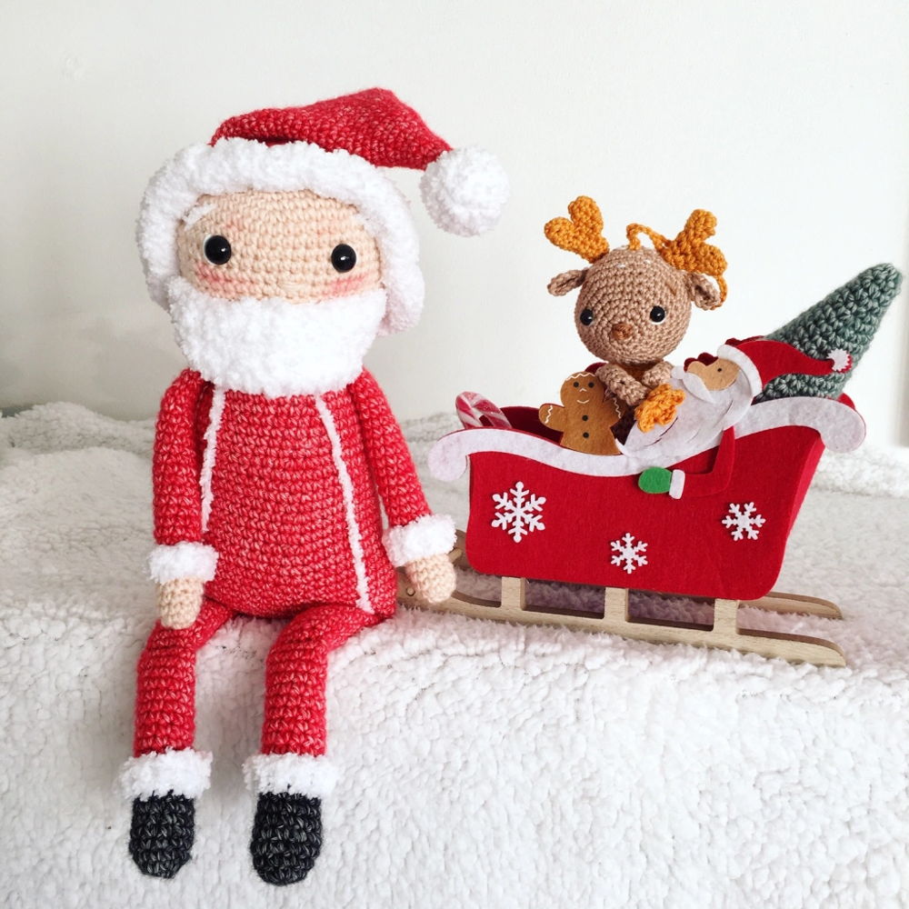 Cuddly Santa Claus with dangling legs