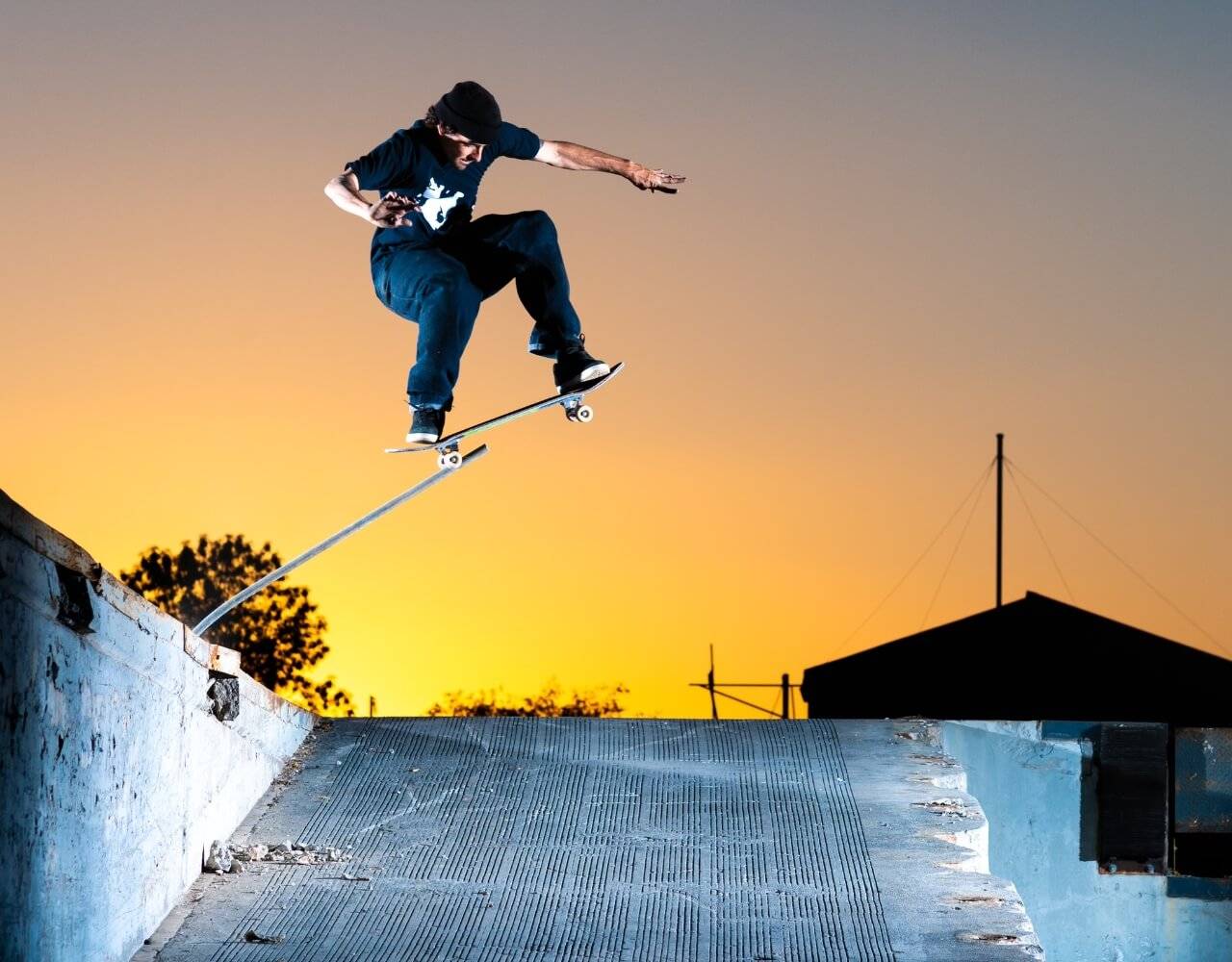 Trevor doing a trick on a skateboard
